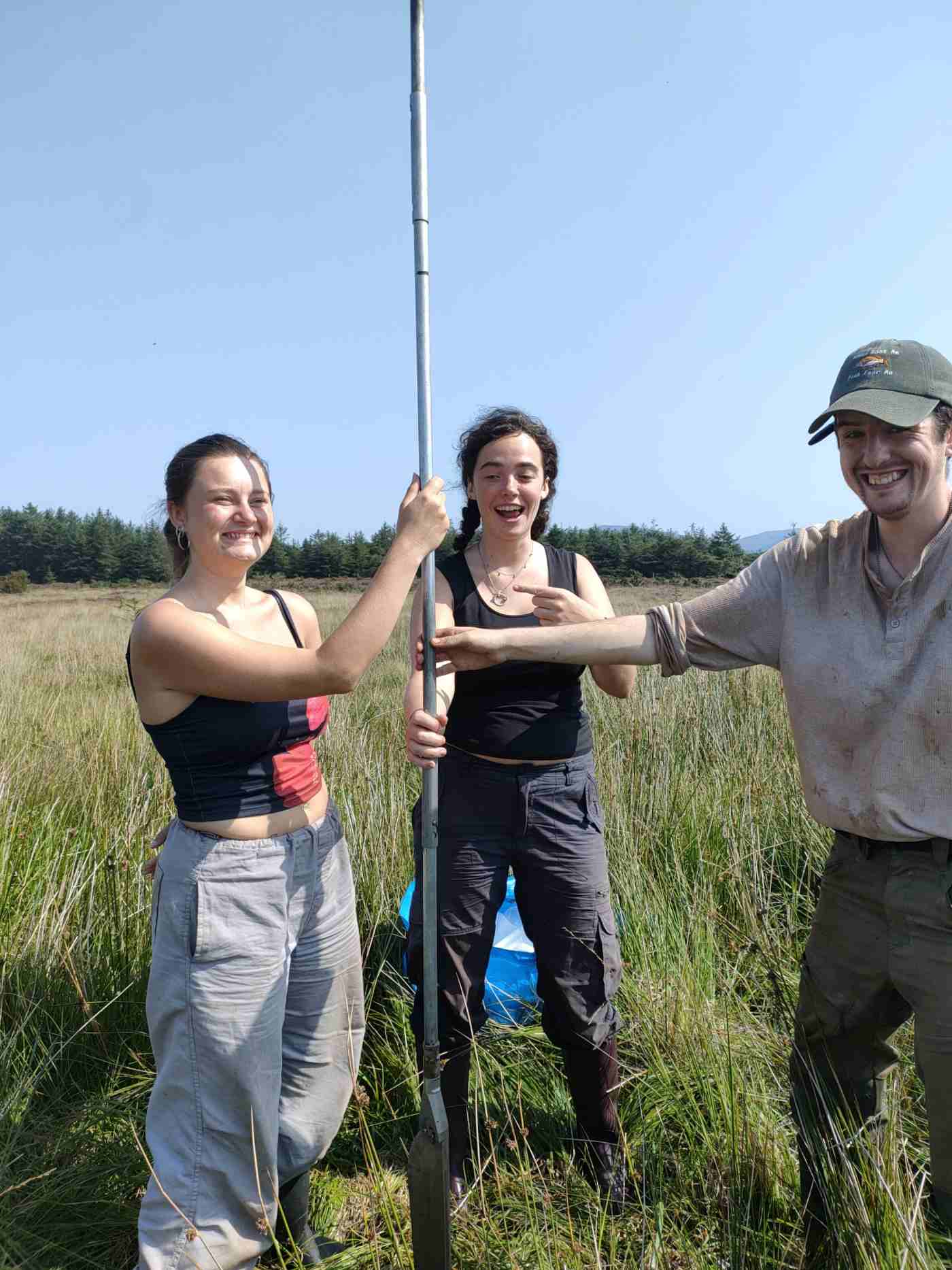 Students coring the Drumadoon peatland with a Russian peat corer, Arran field school, August 2025. Photo credit N. Whitehouse