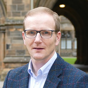 Headshot of Professor Graeme Roy
