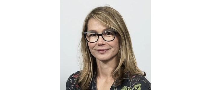 Susan Batchelor, smiling at camera