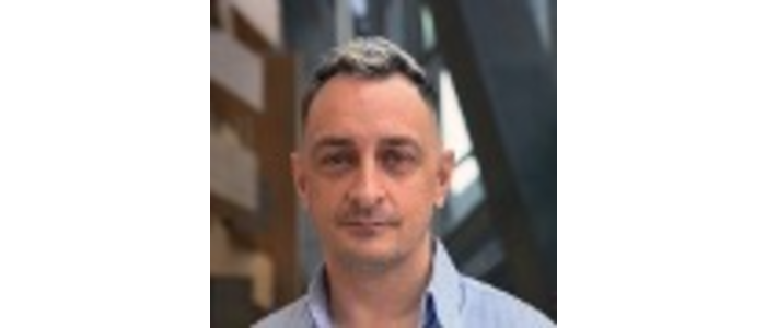 Ross Gordon, smiling at camera