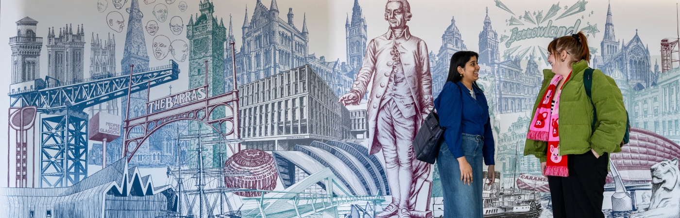 Students standing in front of a wall mural in the Adam Smith Building, Adam Smith Business School