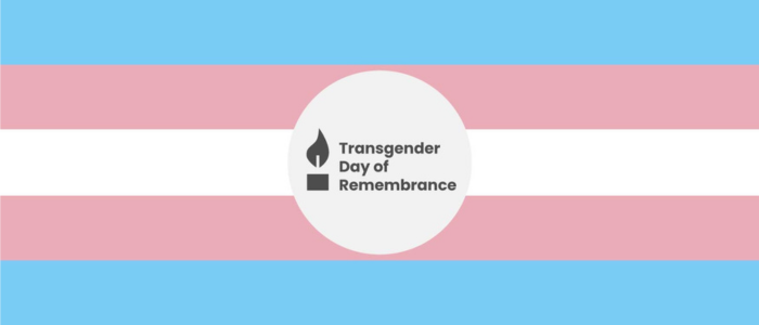 The transgender flag with a logo in the middle reading Transgender Day of Remembrance