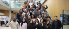 Participants at StartUp Factory Scotland Weekend pose fpr a photograph on the atrium stairs within the Advanced Research Centre at the University of Glasgow, November 2025.