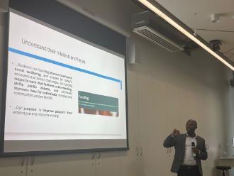 A speaker giving a presentation