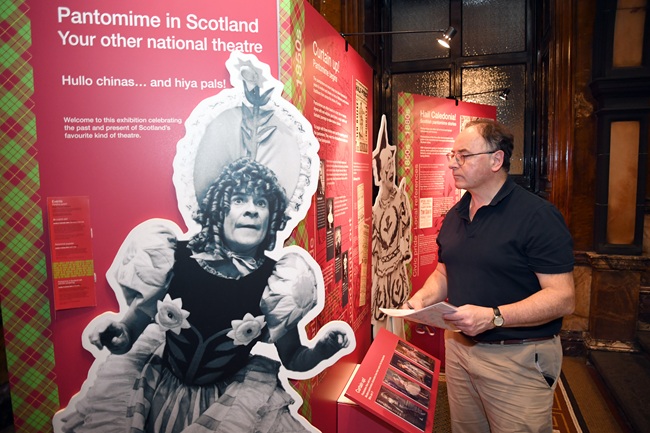 Panto curator Dr Paul Maloney puts finishing touches to City Chambers exhibition