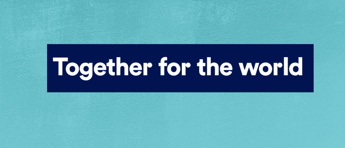 A tagline Together for the World on a teal background