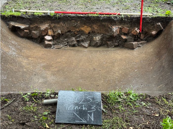 Section shows several clear layers of material used to fill in the Cobra Slalom run