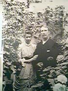 Eliza and James Paterson in formal dress in conservatory in Kilniess, Moniaive, probably soon after their wedding, 24 April 1884. (MS Paterson EU3) - Links to book of the month article