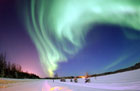 Aurora Borealis over Bear Lake, Alaska, USA.Credit: Joshua Strang, USAF