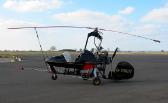 Autogyro on runway.
