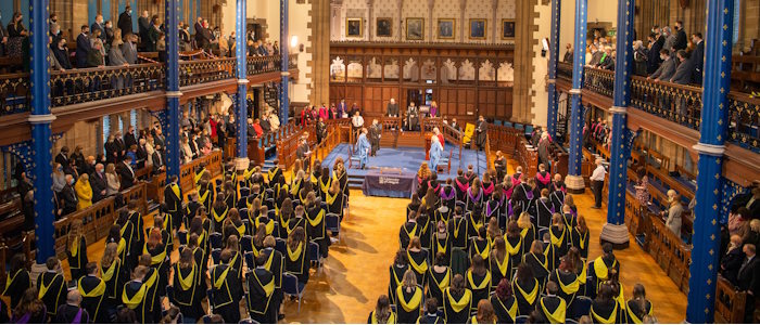 Graduates and parents in Bute Hall during Graduation