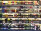 Blurred photo of alcohol bottles on a shop shelf