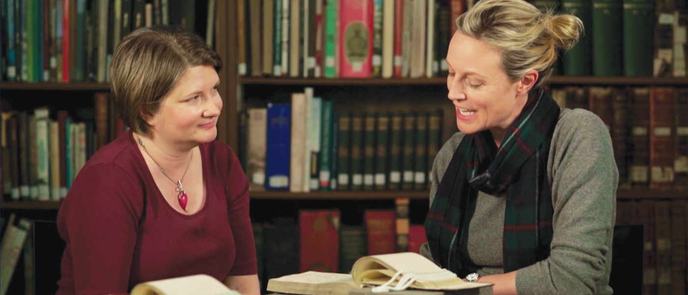 Marta Dusseldorp (right) with UofG Archivist Moira Rankin (photo: BBC 'Who Do You Think You Are?')