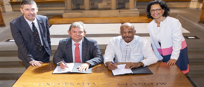 A group photo of the Memorandum of Undersanding signing ceremony between the University of Glasgow and the University of the West Indies