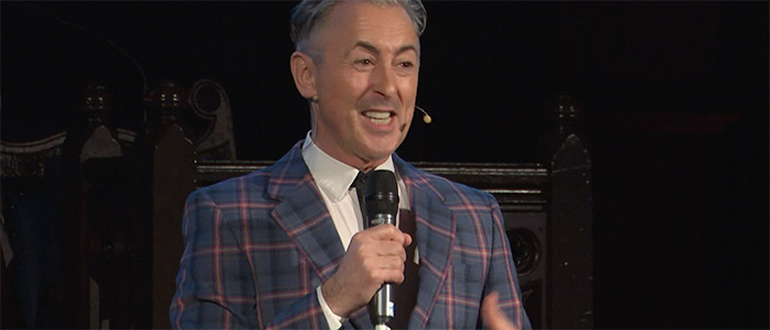 Alan Cumming delivering lecture