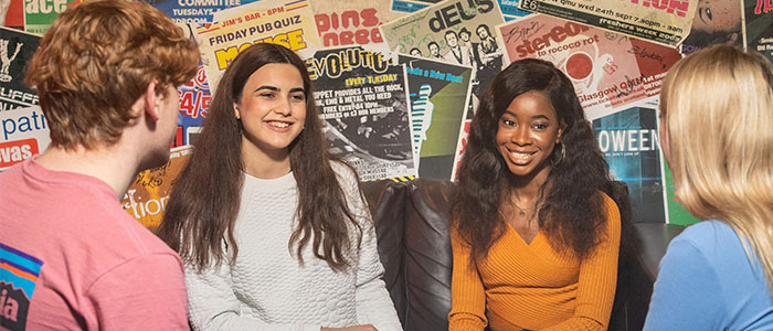 Students sitting in Queen Margaret Union bar