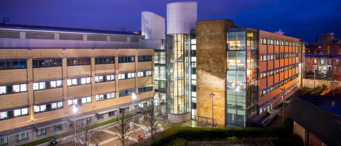 Sir Graeme Davies Building lit up at night