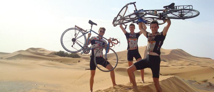 Students holding bikes