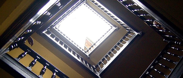 Looking up at the stairwell of a building