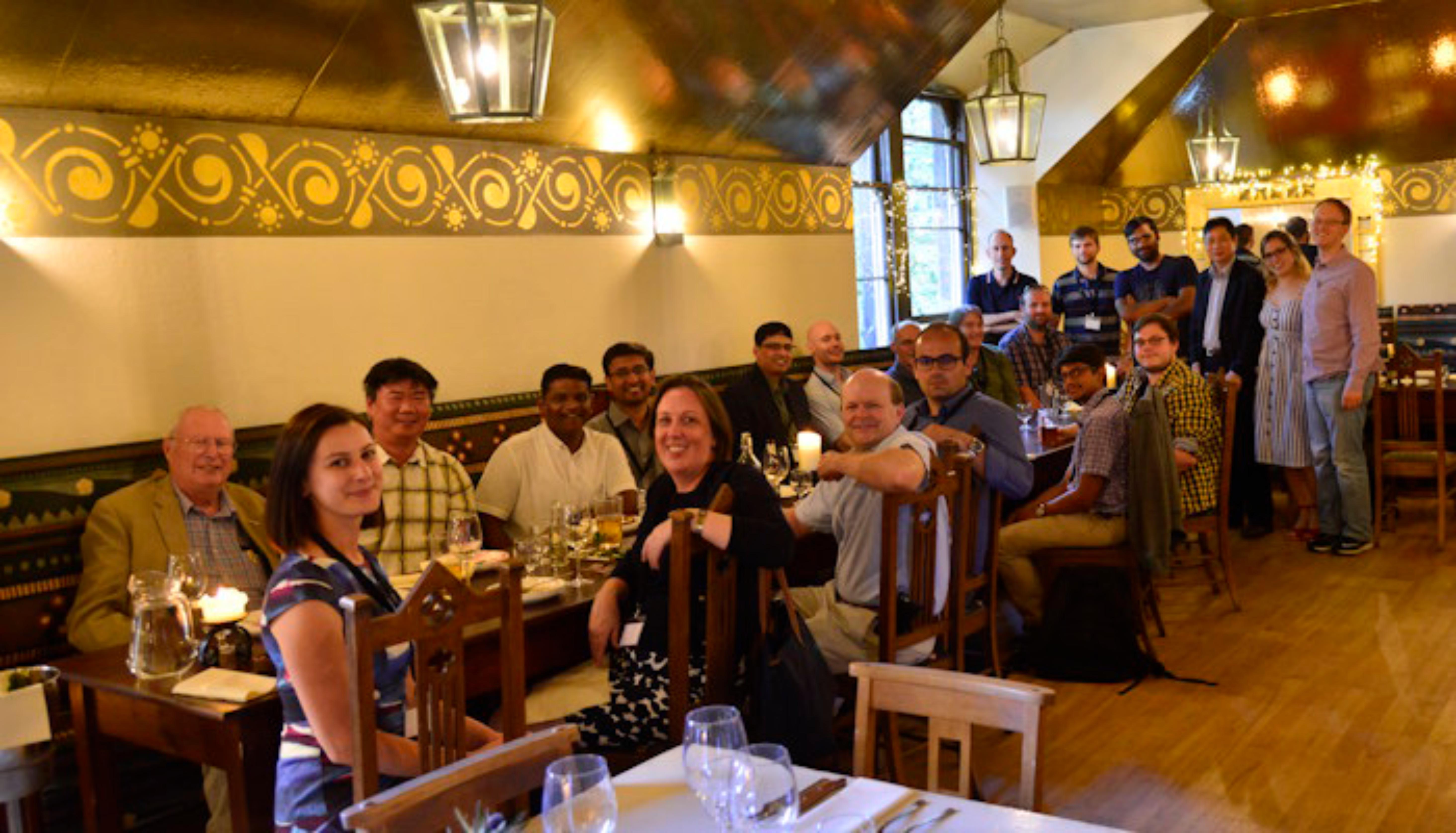 LIGO group meeting around dinner table