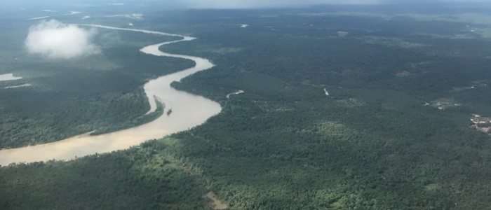 Ariel view of a river snaking through a lush landscape