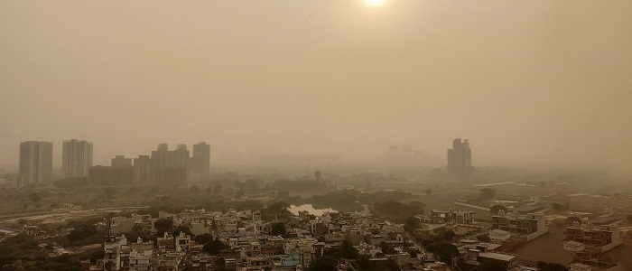 City sView over houses and apartment tower blocks in Delhi, India, with yellowish hazy air due to smog and pollution. Image credit: abhisheklegit | iStockphoto https://www.istockphoto.com/photo/delhi-air-pollution-gm1126605395-296668246cape with polution