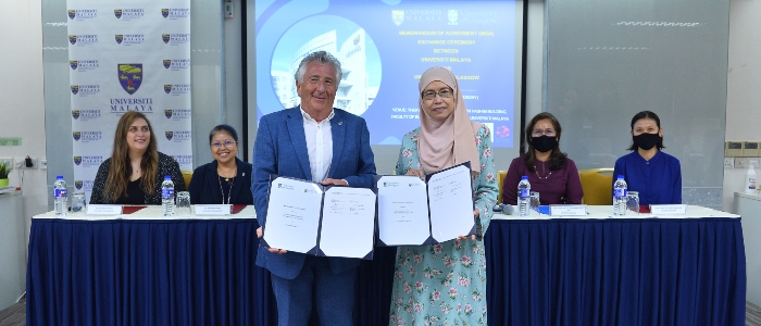 Professor Robert Paton receiving agreements with associates