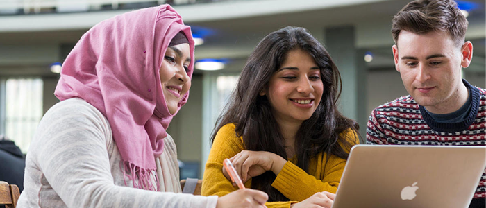 Students sitting at a table 