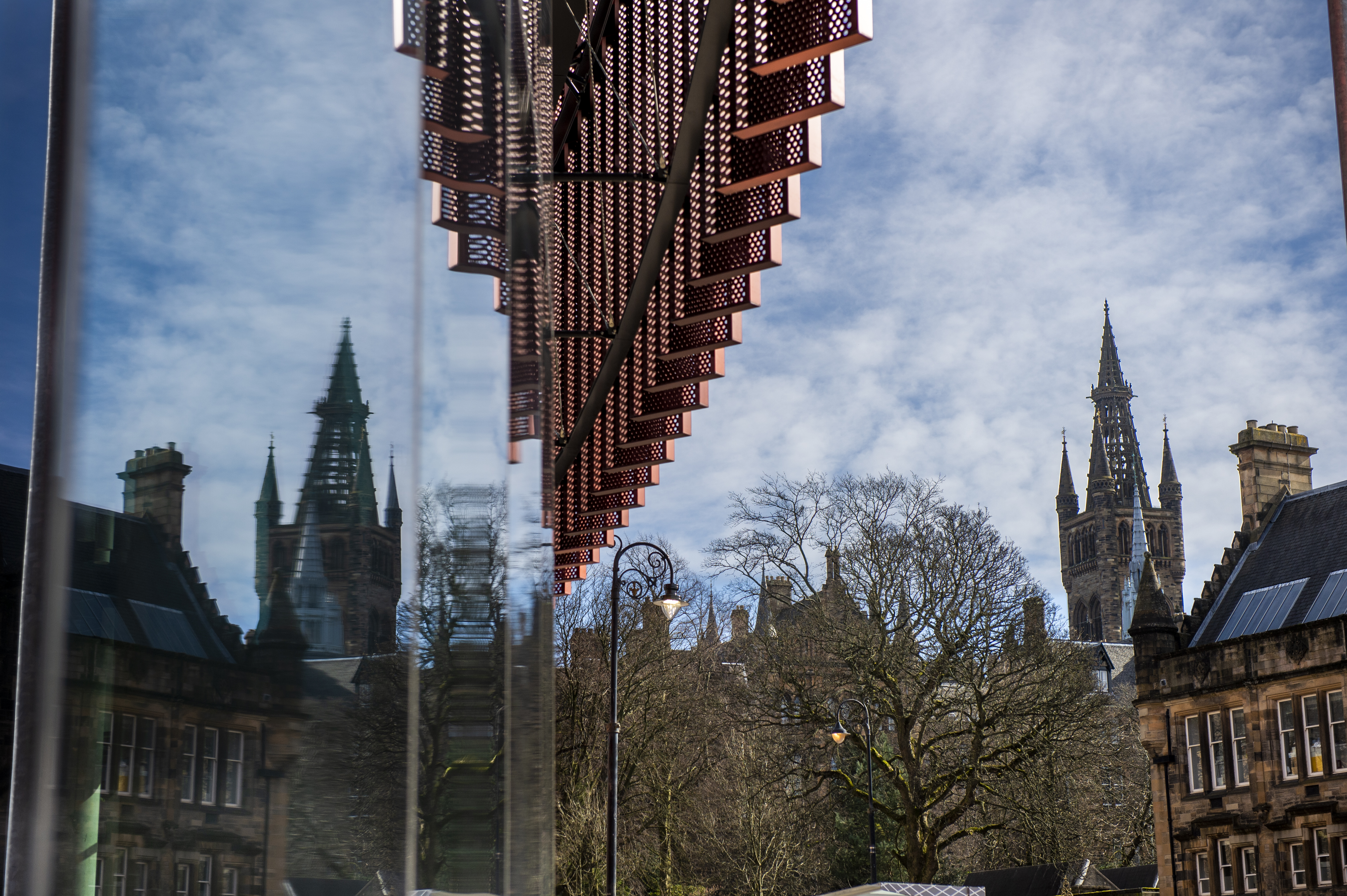 JMS Learning Hub and Gilbert Scott Tower reflection
