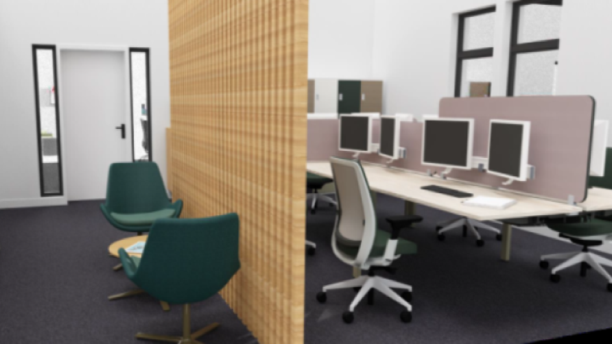 Room with banks of desks, chairs and computers