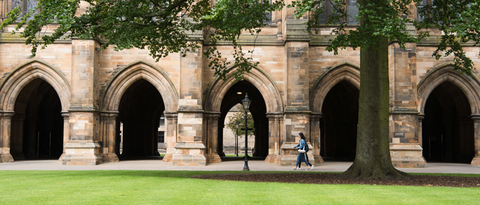 Students walking past the cloisters