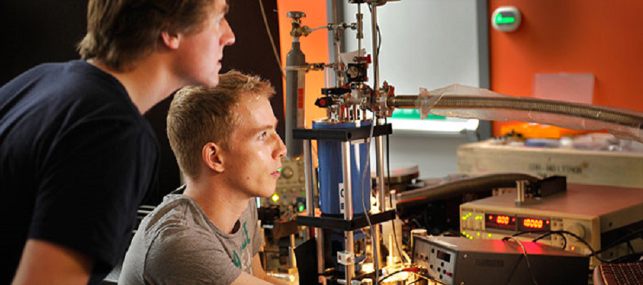 Two people with equipment