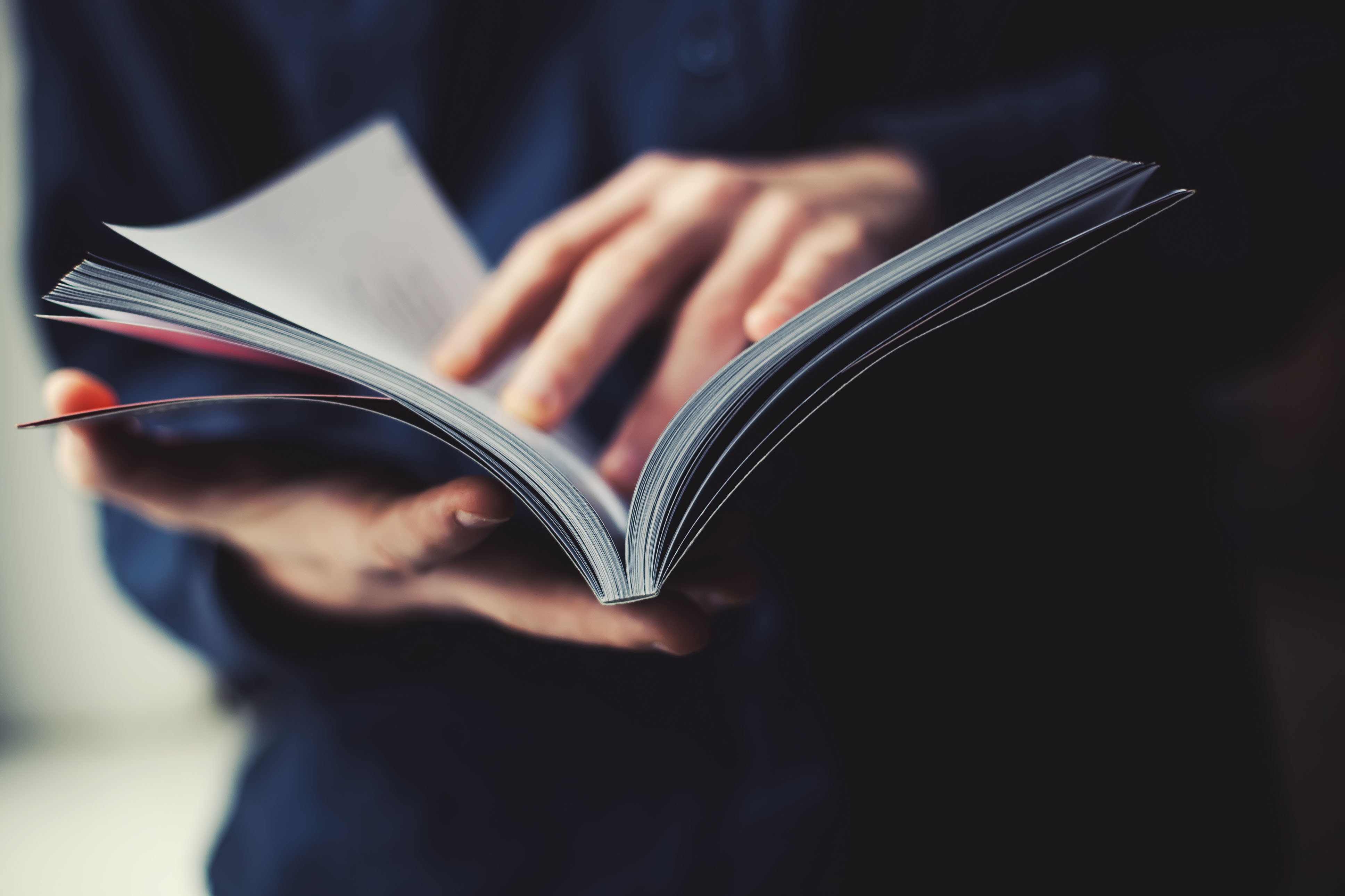 Person reading a publication