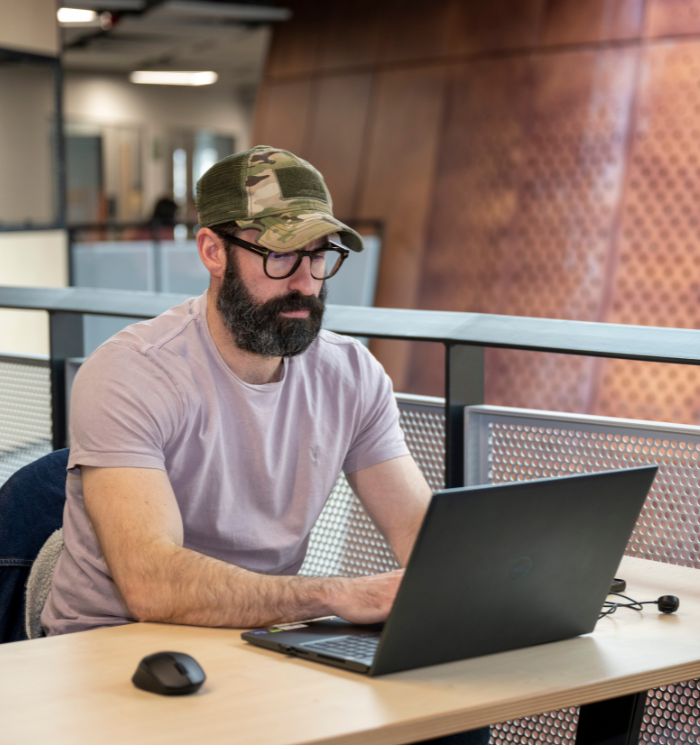 A student studying in the James McCune Smith Learning Hub