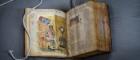 Launch of new £2.4m project called Paratexts Seeking Understanding. The book shows a bible with notes in the margin. 