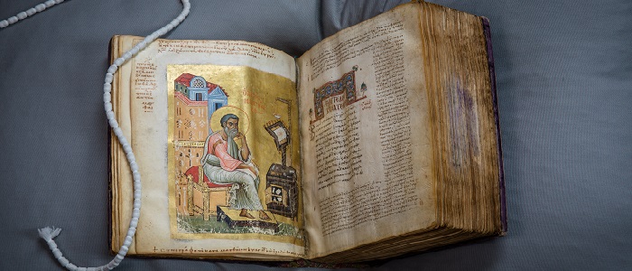 Launch of new £2.4m project called Paratexts Seeking Understanding. The book shows a bible with notes in the margin. 