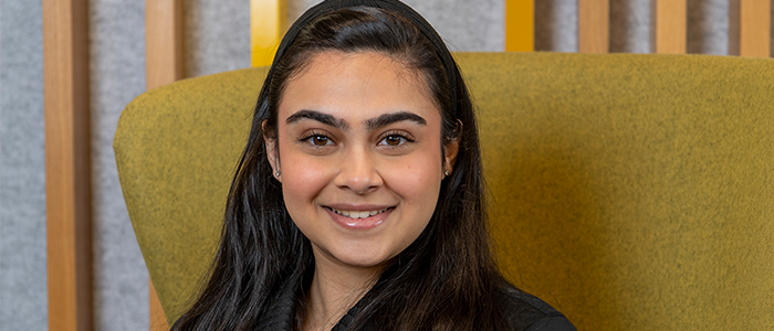 Image of Navya sitting on a chair